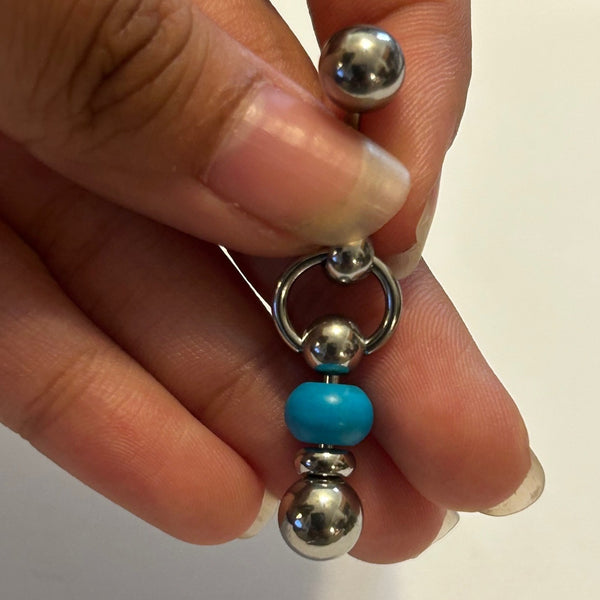 Sterilized Surgical Steel 14g Turquoise Reversible VCH Barbell.