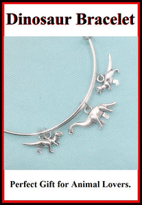 Stunning Dinosaur Charms Handcrafted Expendable Bangle Bracelet.