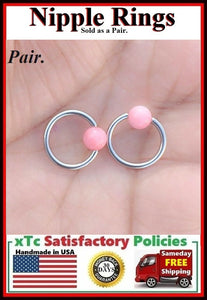 PAIR Sterilized Surgical Steel 1/2" Nipple Rings with Pink Coral Balls.