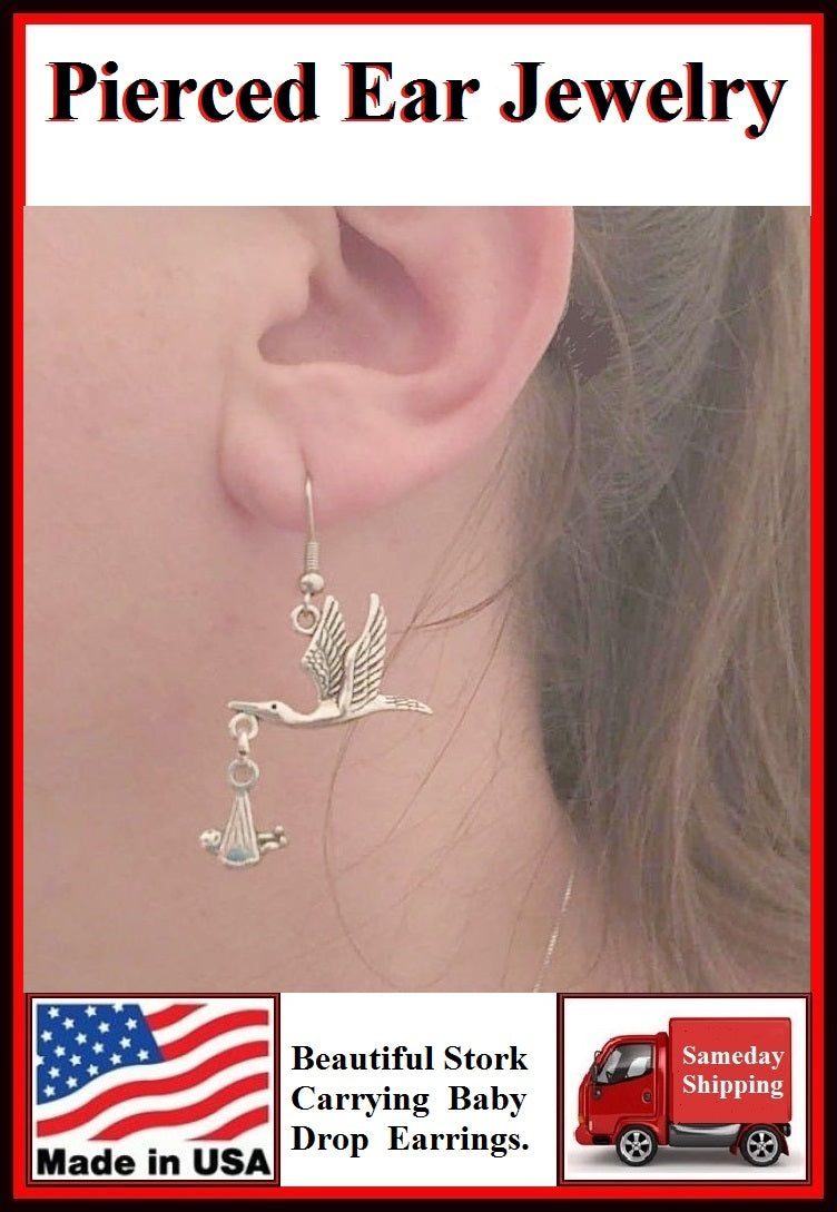 Beautiful STORK Carrying a BABY Silver Dangle Earrings.