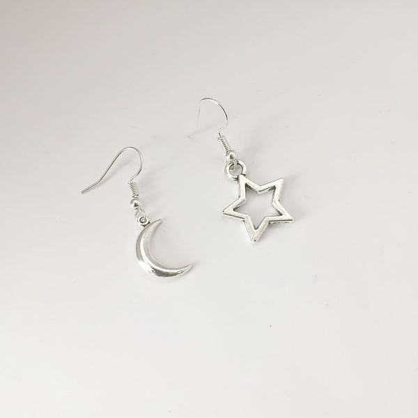 Beautiful Reversible Crescent Moon and Star Silver Earrings.
