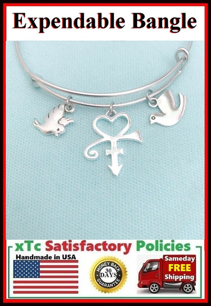 Great Singer Symbol & Doves Charm Expendable Bangle.