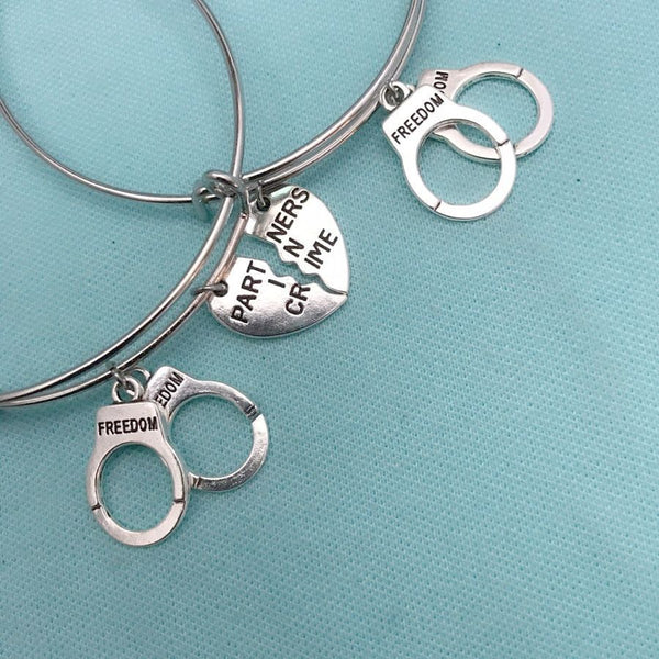 Handcuff & PARTNERS in CRIME Charms Set of 2 Bangles.