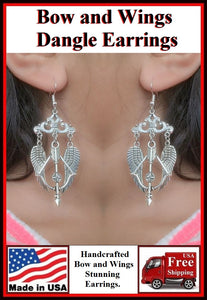Stunning Bow and Wings Dangle Earrings.