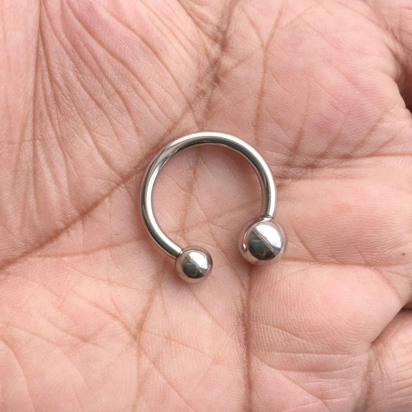 Sterilized Surgical Steel 10g Horseshoe to stop Ball Sinking in PA Piercing.