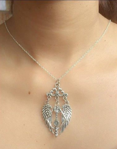 Beautiful Handcrafted Wings n Bow Charms Silver Necklace.